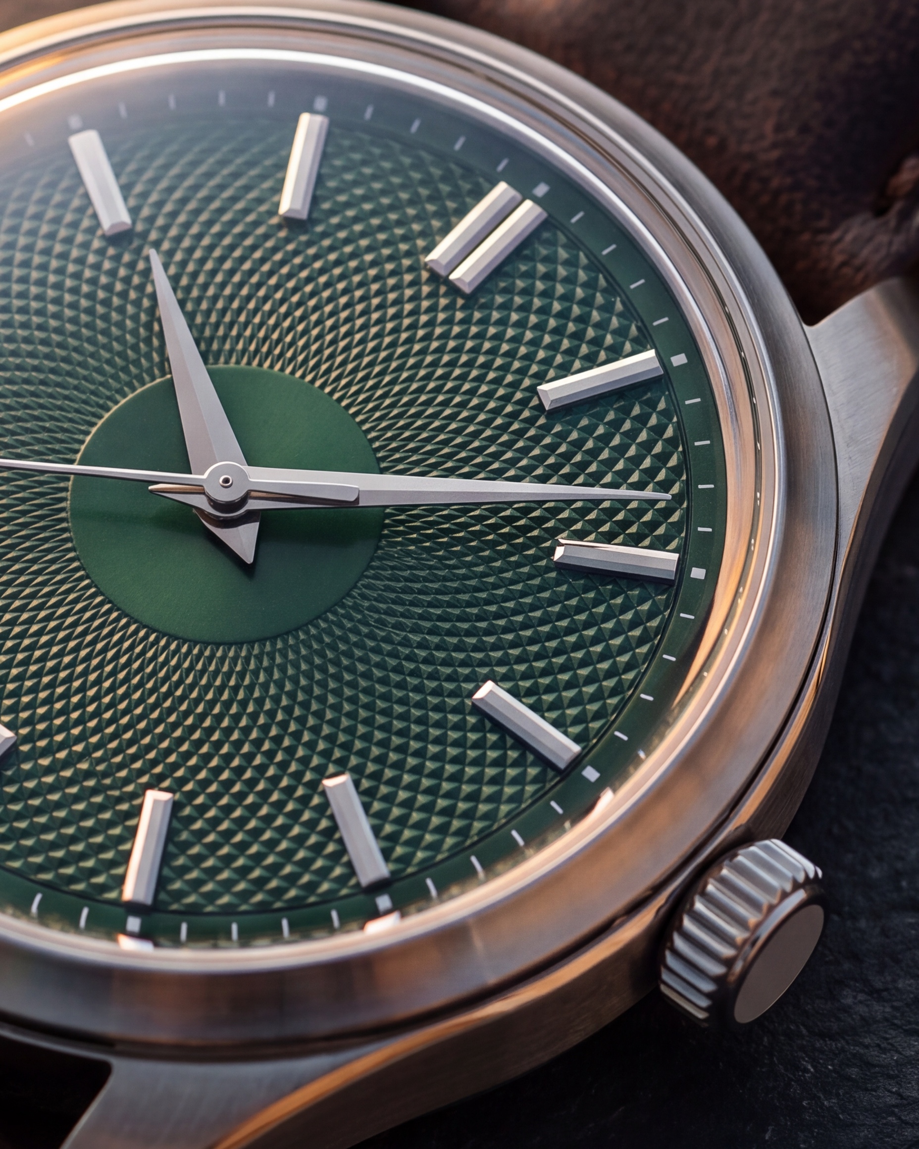 Watch — 100% crop of the hero frame, dial through crown